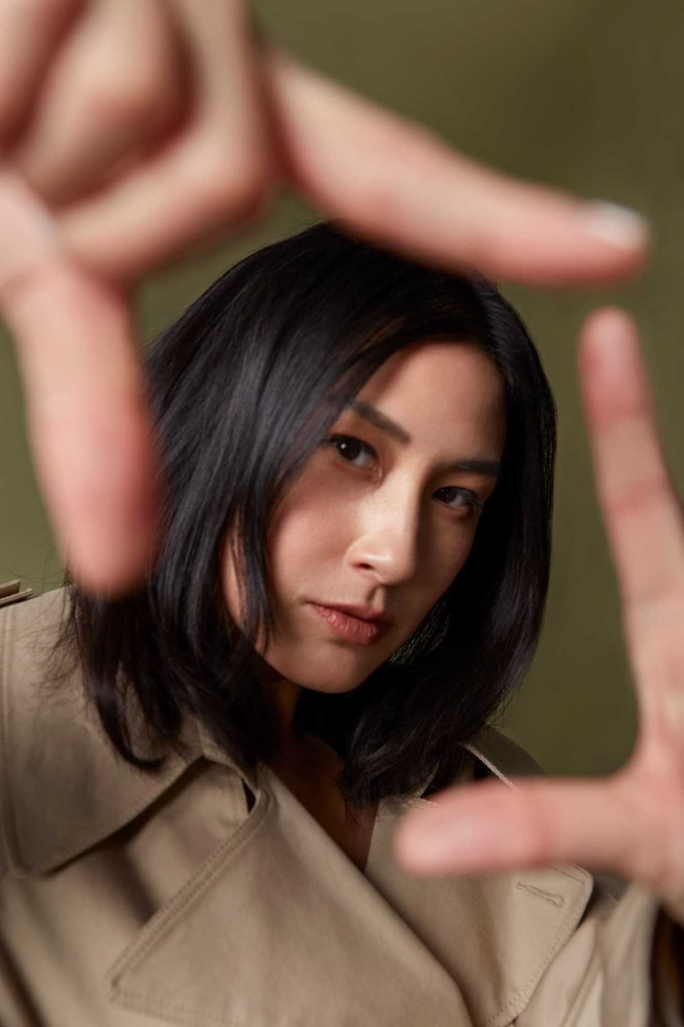 Kathy Uyen framing a shot with her hands