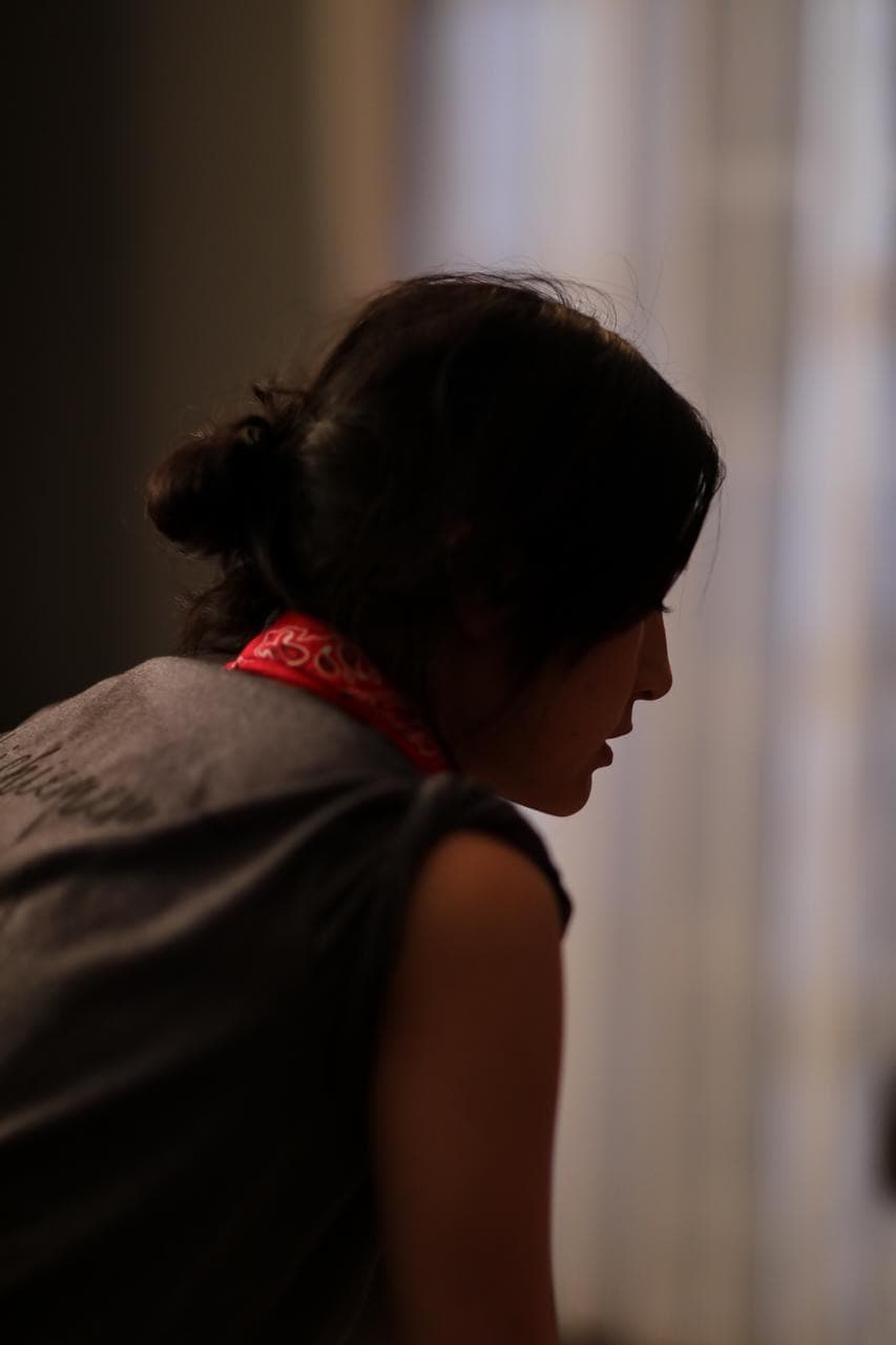Kathy Uyen turned away, a quiet moment