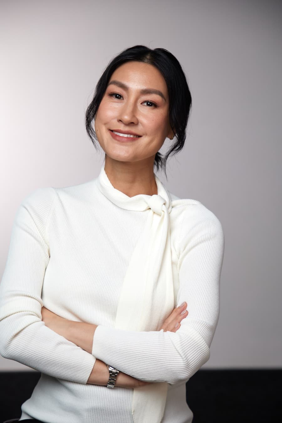 Kathy Uyen, arms folded