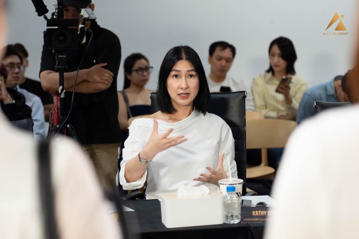 Kathy Uyen giving notes as a judge