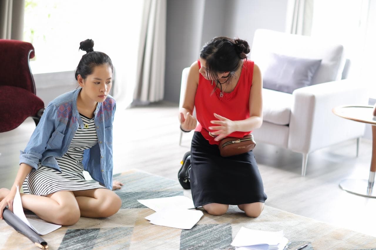 Kathy Uyen working through a scene with an actor